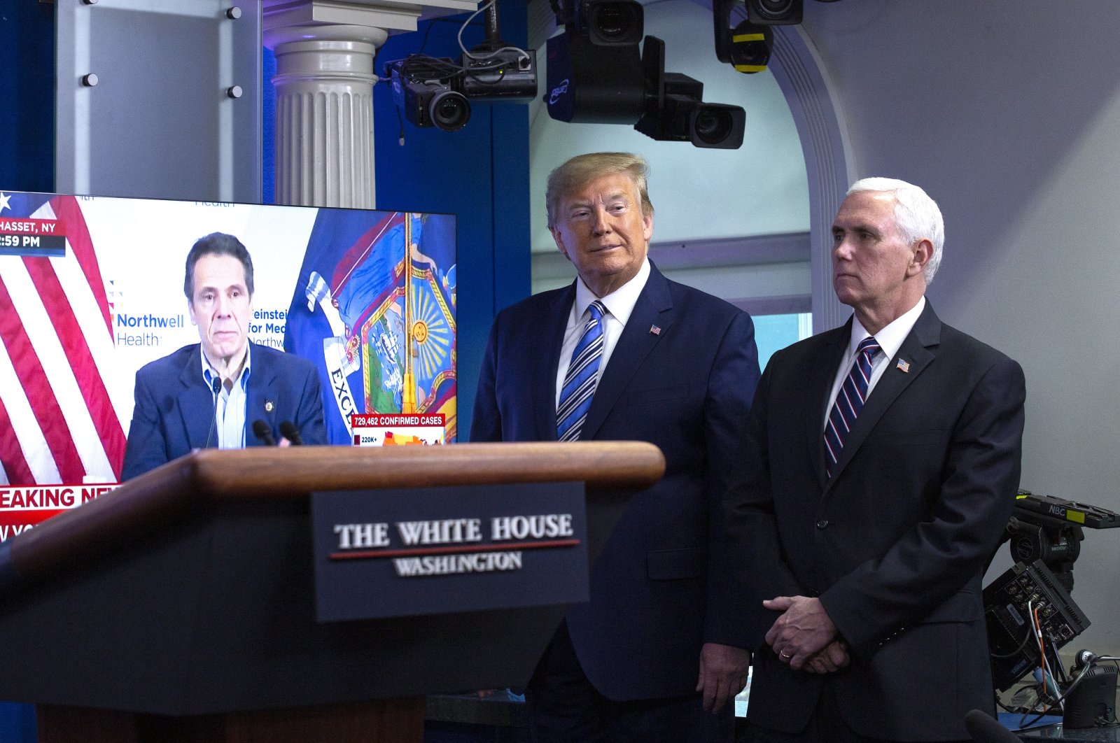 United States President Donald J. Trump (C), joined by United States Vice President Mike Pence (R), listen to a video of New York Governor Andrew Cuomo during a coronavirus task force news conference in the White House in Washington DC, USA, 19 April, 2020. (EPA Photo)