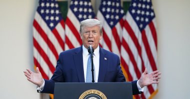 U.S. President Donald Trump gestures as he speaks during the daily briefing on the novel coronavirus in the Rose Garden of the White House, in Washington, D.C., U.S., April 15, 2020. (AFP Photo)