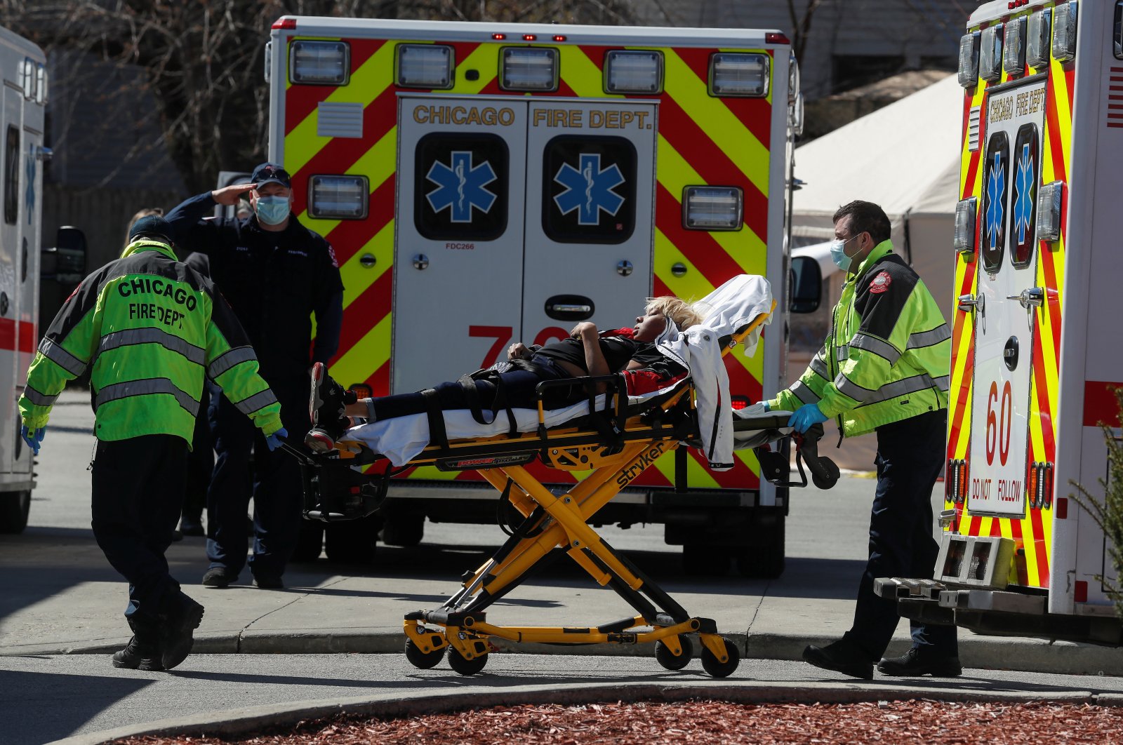 A woman is taken from a Chicago Fire Department ambulance into the emergency room at Roseland Community Hospital, as the spread of the coronavirus disease (COVID-19) continues, in the South Side of Chicago, Illinois, U.S., April 21, 2020. (Reuters Photo)