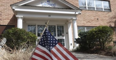 This Wednesday, April 1, 2020, file photo, shows an entrance to the Lakeland Health Care Center, a nursing home in Wanaque, N.J. Multiple people at the facility have died of COVID-19, the disease caused by the new coronavirus, according to the borough's Mayor Dan Mahler. (AP Photo)
