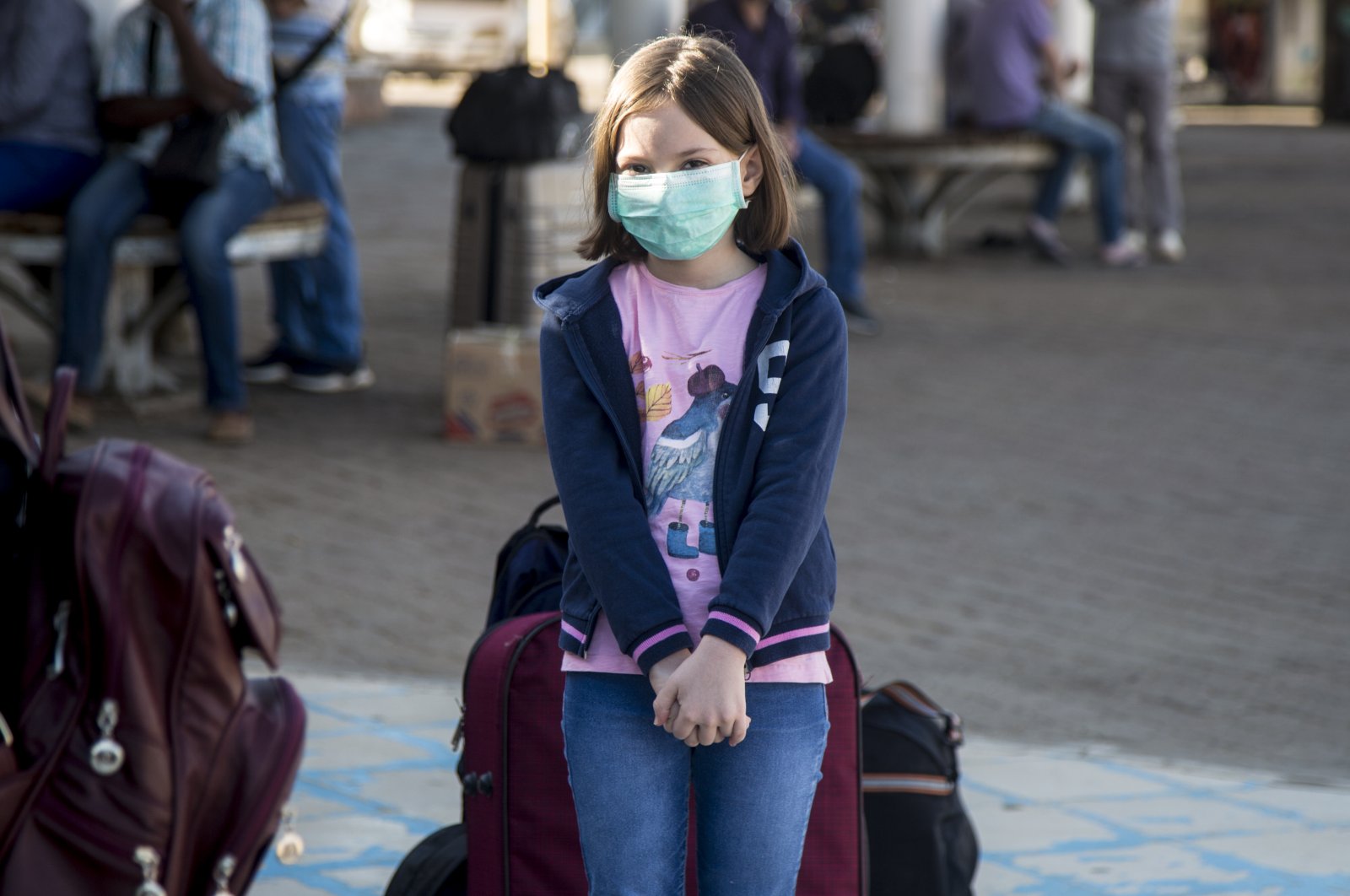 A Turkish girl waits at Khartoum International Airport to board a Turkish Airlines flight as part of Ankara's plan to evacuate its citizens, Khartoum, Sudan, April 22, 2020. (AA Photo)