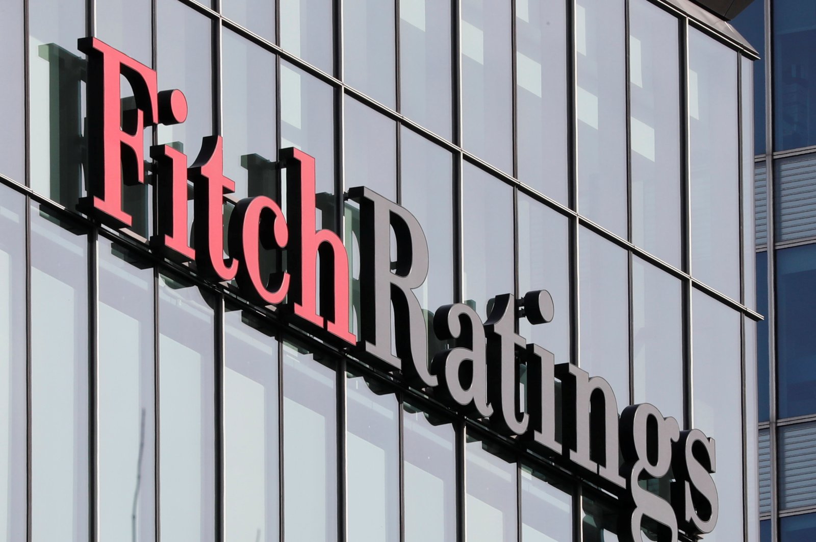 The Fitch Ratings logo is seen at their offices at Canary Wharf financial district in London, Britain, March 3, 2016. (Reuters Photo)