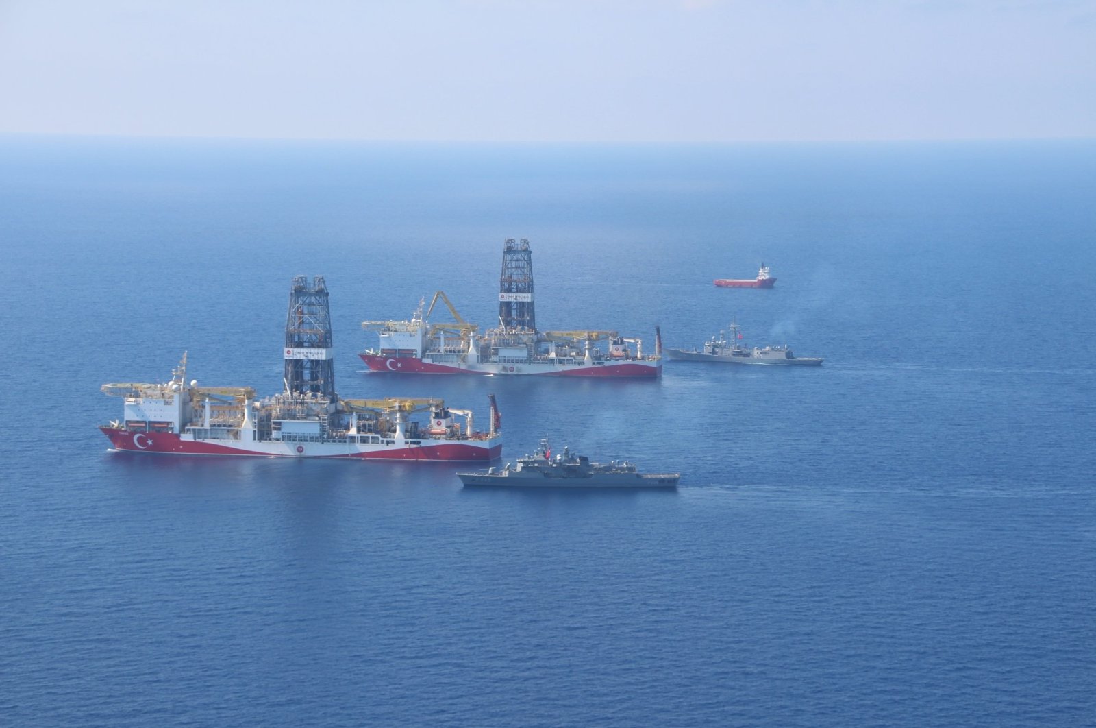 Turkey's drillships Fatih and Yavuz in the Eastern Mediterranean along with Turkish Navy vessels. (IHA File Photo)