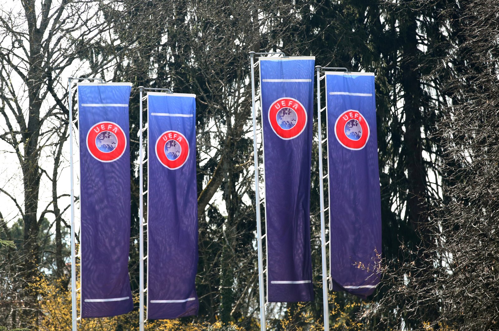 Flags posted outside the headquarters of the UEFA before an executive committee meeting in Nyon, Switzerland, March 17, 2020. (Reuters Photo)