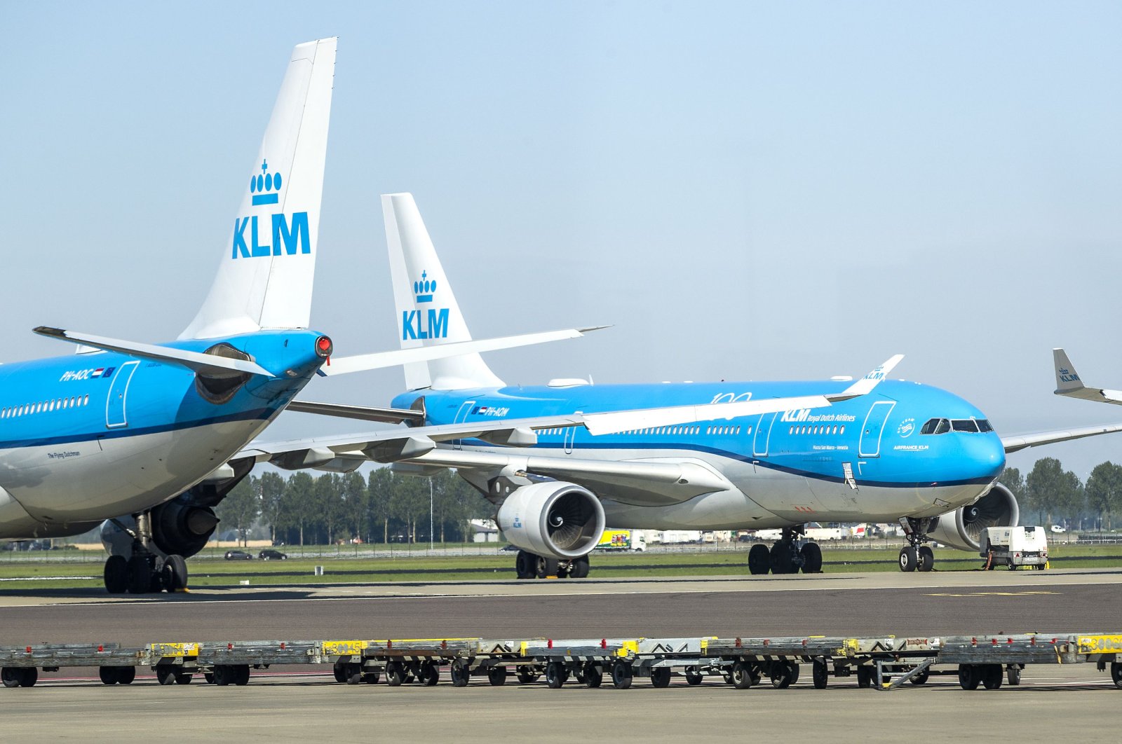 KLM aircraft are seen at a standstill on the tarmac of Schiphol airport, on April 23, 2020, as the country is under lockdown to stop the spread of the Covid-19 pandemic caused by the novel coronavirus. (AFP Photo)
