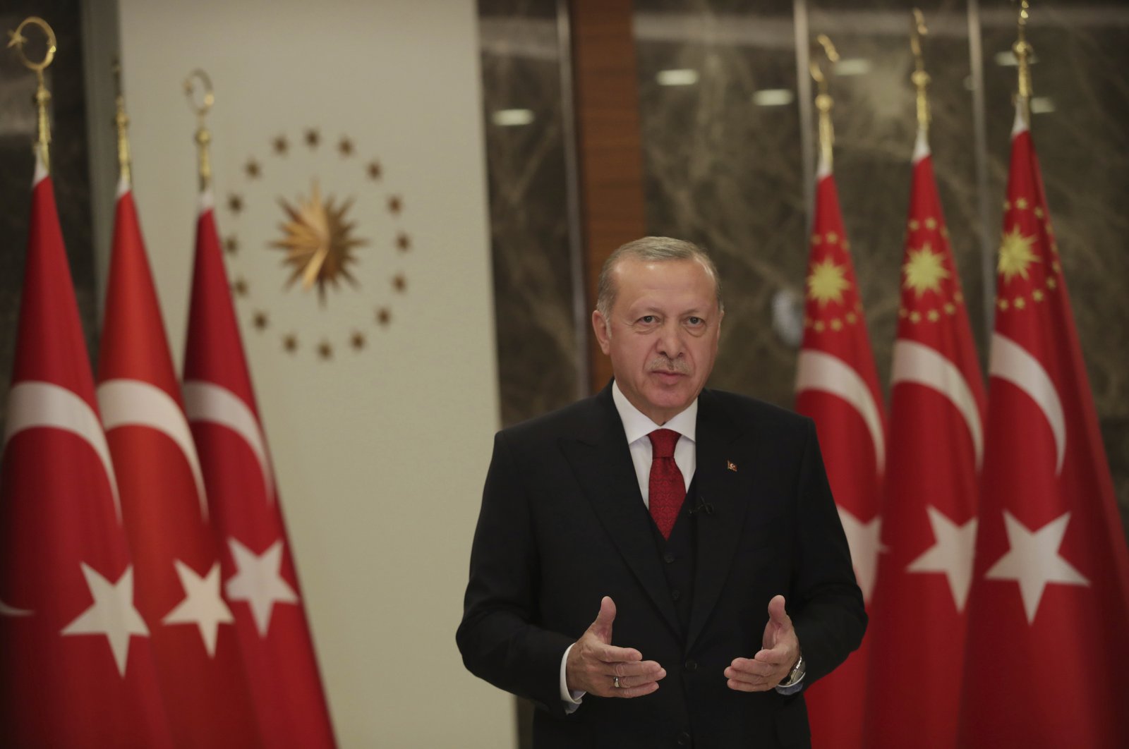 President Recep Tayyip Erdoğan stands during an event to mark Turkey's National Sovereignty and Children's Day, in Istanbul, April 23, 2020. (AP Photo)