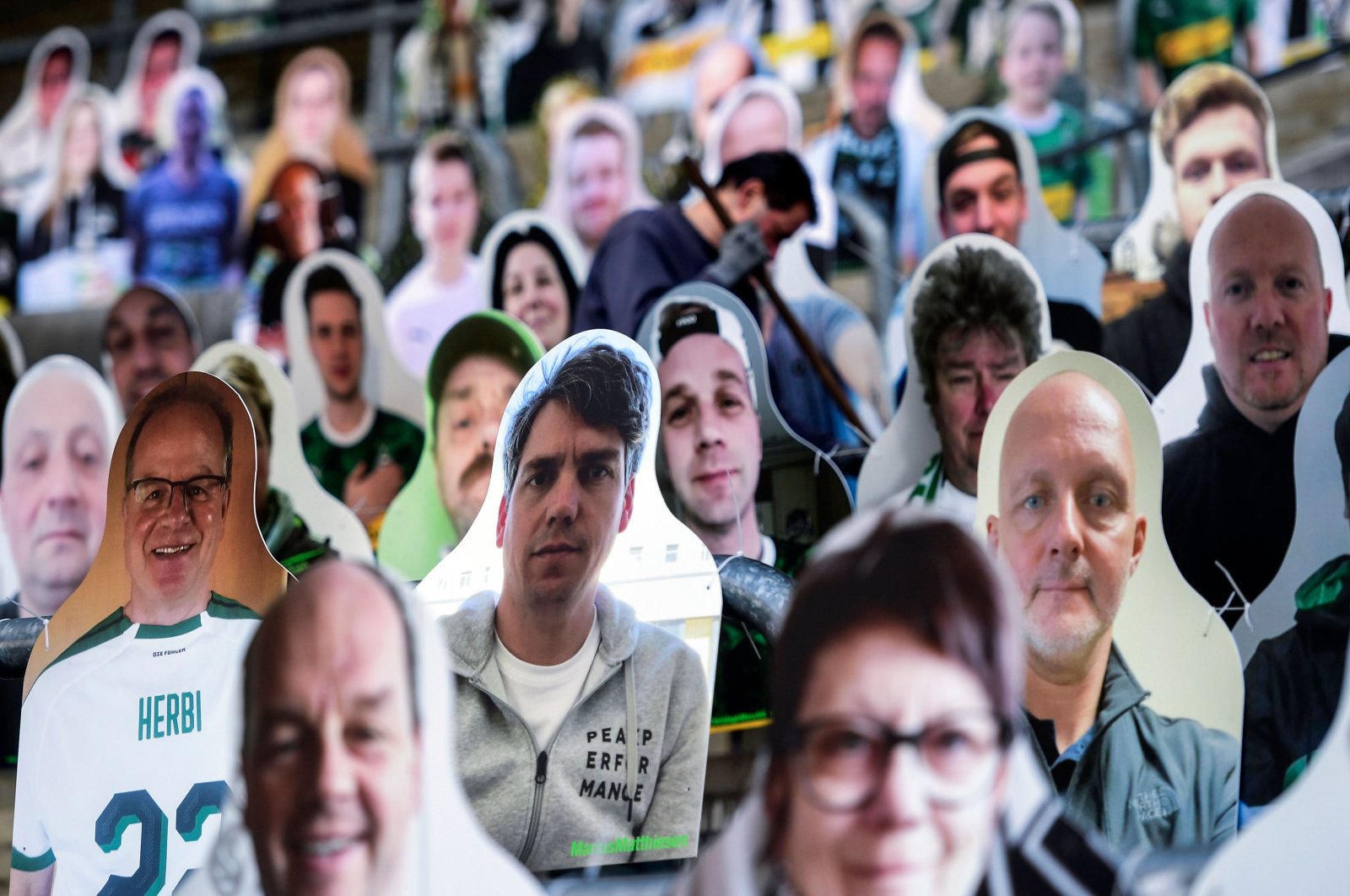 Cardboard cut-outs with portraits of Borussia Moenchengladbach's supporters are seen at the Borussia Park football stadium in Moenchengladbach, western Germany, amid the novel coronavirus COVID-19 pandemic, April 16, 2020. (AFP Photo)
