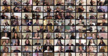 In a photo provided by the Metropolitan Opera, members of the Metropolitan Opera Orchestra and chorus performing from homes for the company’s At-Home gala, which was transmitted Saturday, April 25, 2020. (AP Photo)