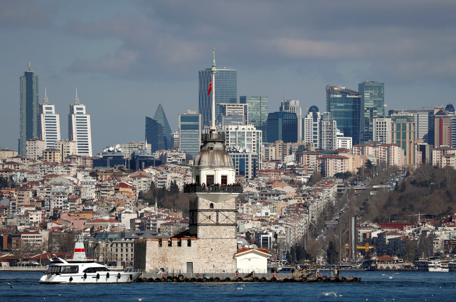 Maiden's Tower, an islet on the Bosporus, is pictured with the city's skyscrapers in the background, in Istanbul, Turkey, Feb. 23, 2020. (Reuters Photo)