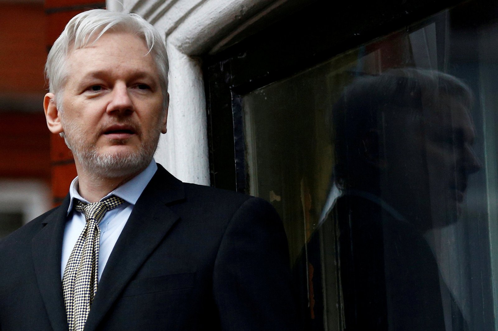 WikiLeaks founder Julian Assange makes a speech from the balcony of the Ecuadorian Embassy, London, Feb. 5, 2016. (Reuters Photo)