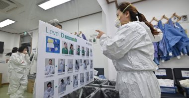 Nurses wearing protective gear prepare for a shift caring for patients infected with the coronavirus at Keimyung University Daegu Dongsan Hospital in Daegu, South Korea, April 29, 2020. (AFP)