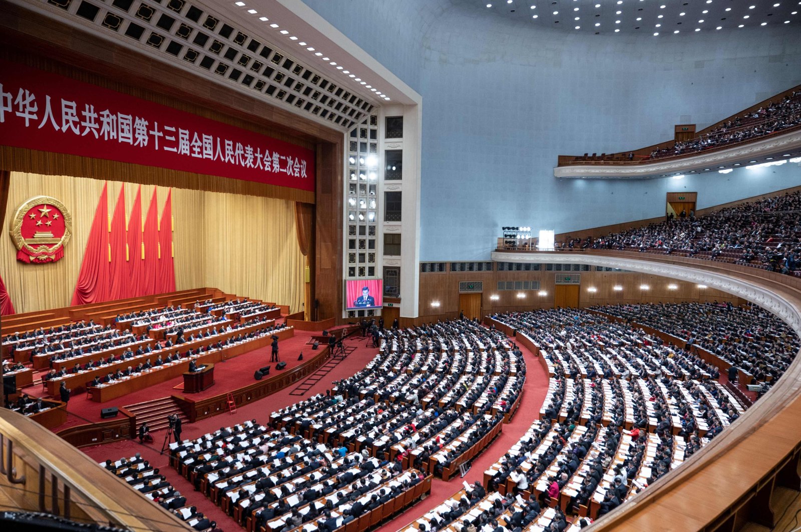 This file photo taken on March 12, 2019 shows a general view of a plenary session of the National People's Congress (NPC) at the Great Hall of the People in Beijing. (AFP Photo)