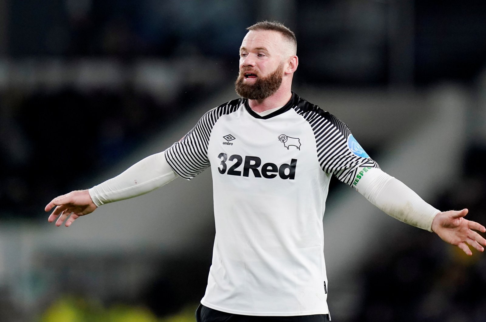 Wayne Rooney reacts during a match against Manchester United, in Derby, Britain, Thursday, March 5, 2020. (Reuters Photo)