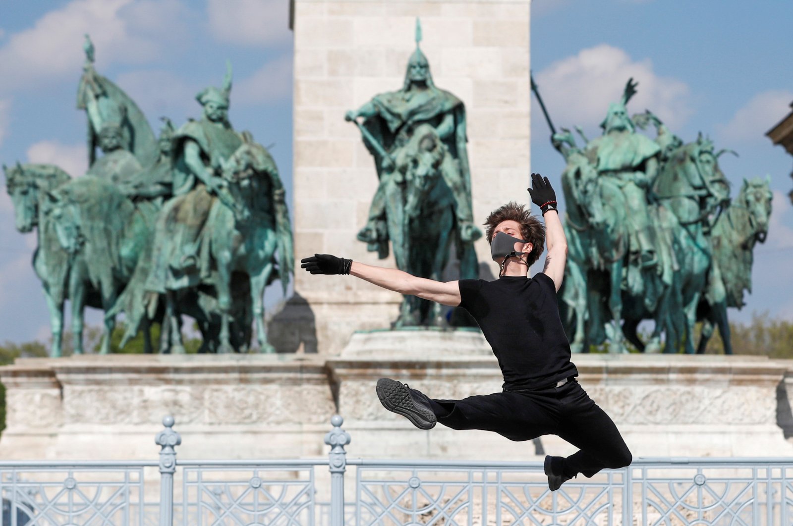 Hungarian ballet dancer Zsolt Kovacs performs a choreographic piece he has designed for the "coronavirus melody," a musical composition created by MIT scientists from a model of the protein structure of SARS-CoV-2, during the coronavirus disease outbreak in Budapest, Hungary, April 28, 2020. (Reuters Photo)