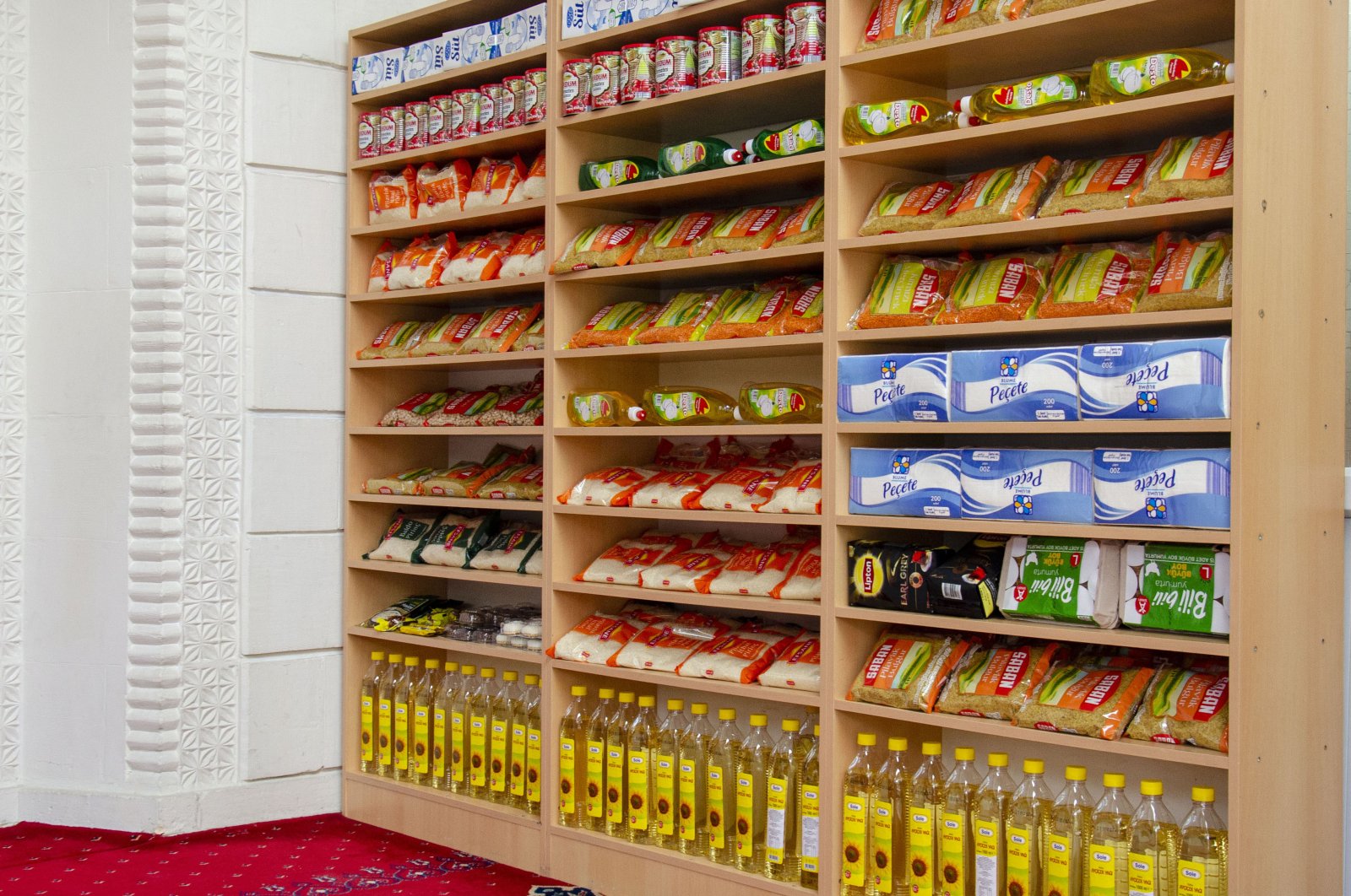 Shoe racks in a mosque have been turned into food shelves in a bid to help those in need during the coronavirus lockdown, Konya, Turkey, April 29, 2020. (AA Photo)