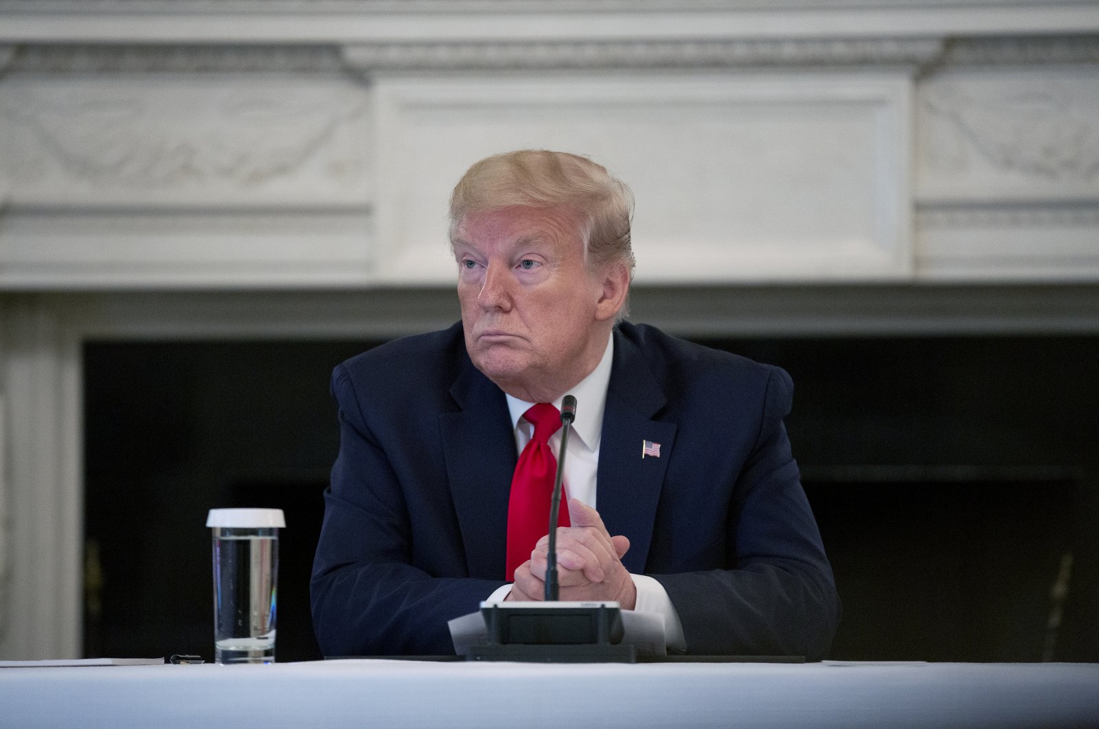 US President Donald J. Trump participates in a roundtable with industry executives on the plan for 'Opening Up America Again' in the State Dining Room of the White House in Washington, DC, USA, 29 April 2020. (EPA Photo)