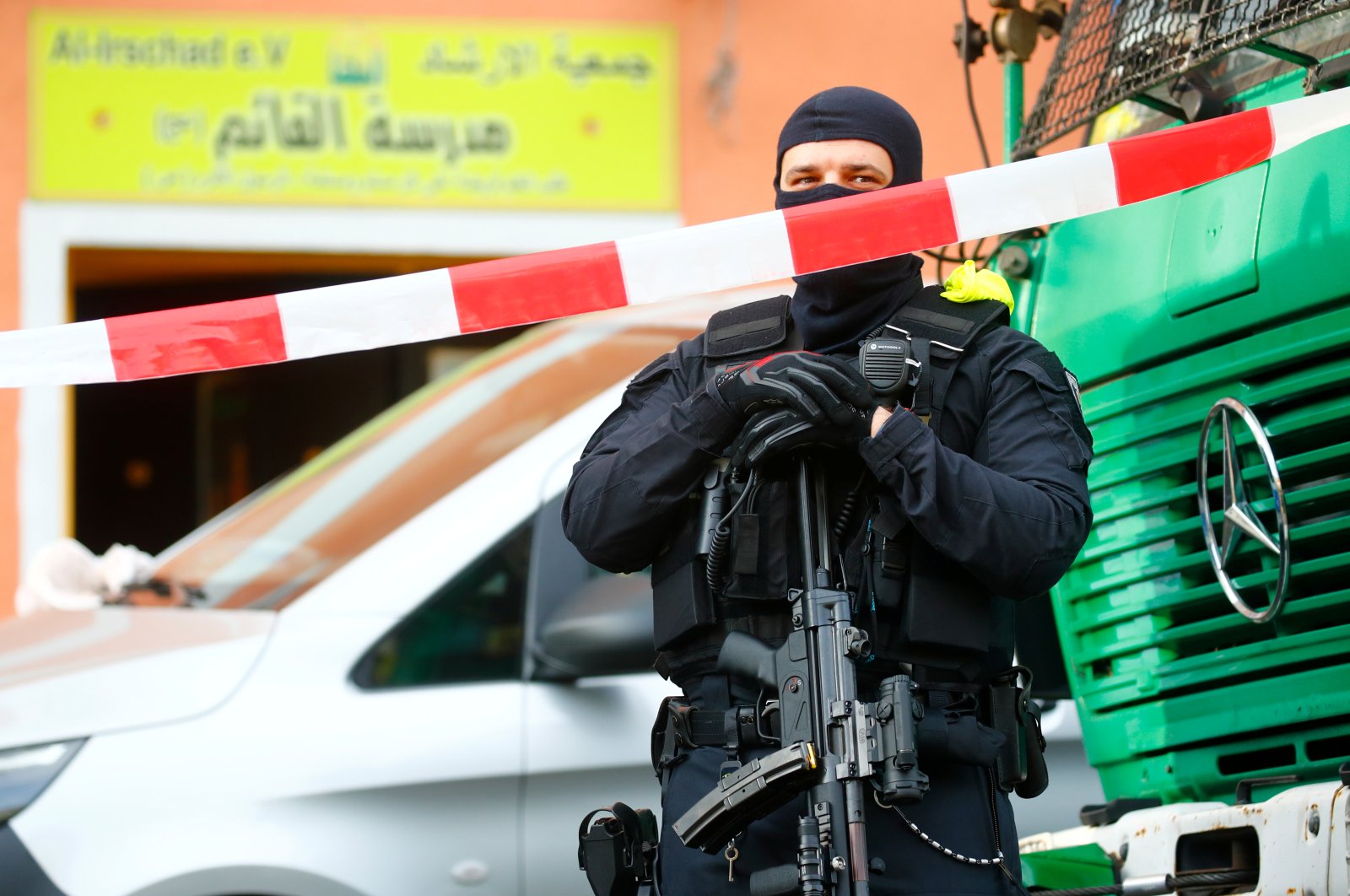 German special police guards the entrance of the El-Irschad (Al-Iraschad e.V.) centre in Berlin, Germany, April 30, 2020, after Germany has banned Iran-backed Hezbollah on its soil and designated it a terrorist organisation. (Reuters Photo)   