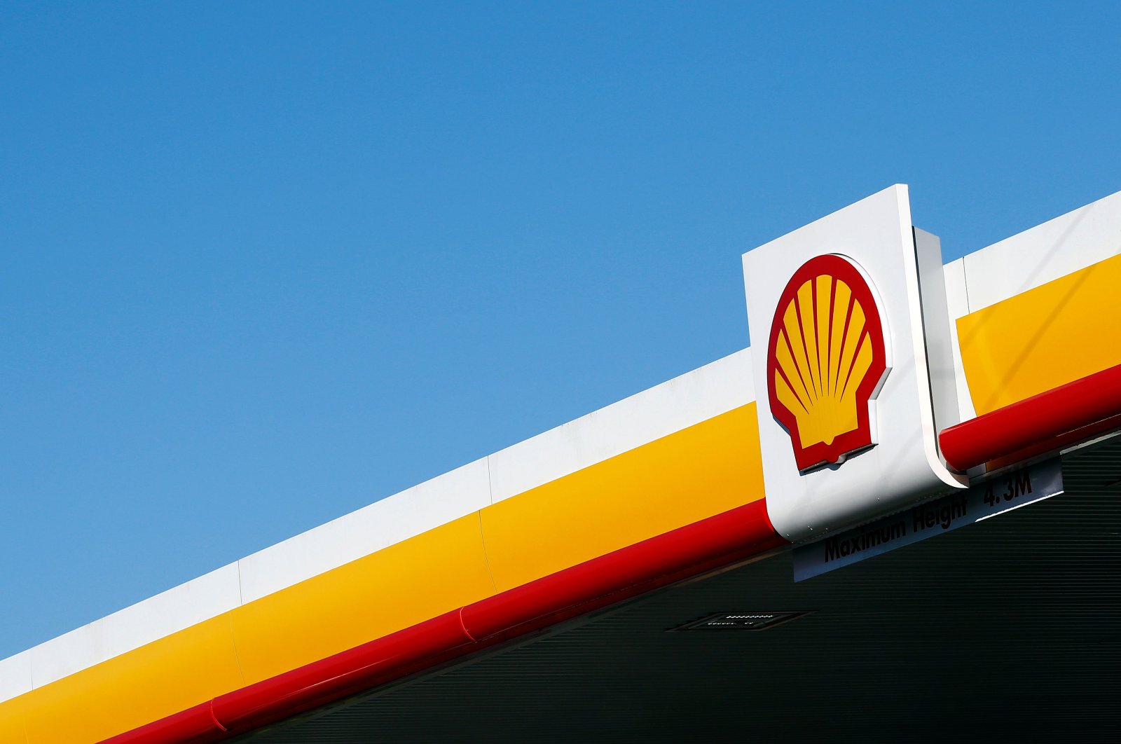 In this file photo taken on January 20, 2016, a Shell logo is pictured outside a Royal Dutch Shell petrol station in Hook, near Basingstoke. (AFP Photo)