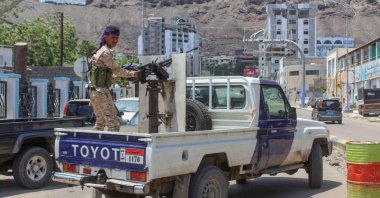 A fighter with the Southern Transitional Council (STC) mans a gun in the back of a vehicle after the council declared self-rule in the south, Aden, Yemen, April 26, 2020. (AFP Photo)