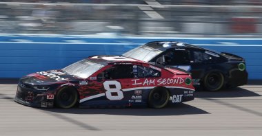 Tyler Reddick races past Reed Sorenson during a NASCAR race in Avondale, Arizona, March 8, 2020. (AP Photo)