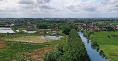 An aerial view shows the Canal de l'Escaut, and the decanting basin near the Tereos sugar factory, Ramillies, April 30, 2020. (REUTERS Photo)