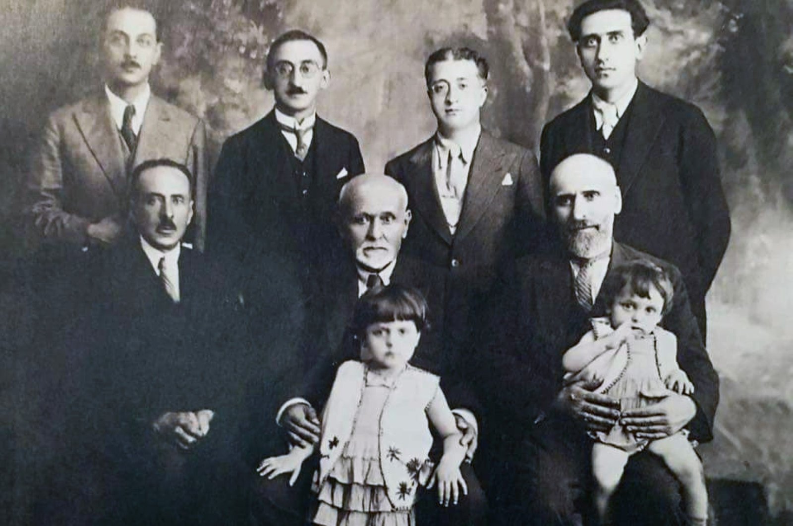 Standing from left to right, Mahir İz, Ali Nihat Tarlan, Abdülbaki Gölpınarlı, Şeyh Sadettin Nüzhet Ergün and sitting from left to right, Abdülbaki Baykara, Ömer Ferid Kam and Tahir Olgun.
