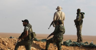 Fighters from the Popular Mobilization Forces secure the Iraqi-Syrian border in al-Qaim in the Anbar province, Iraq, Nov. 12, 2018. (AFP Photo)