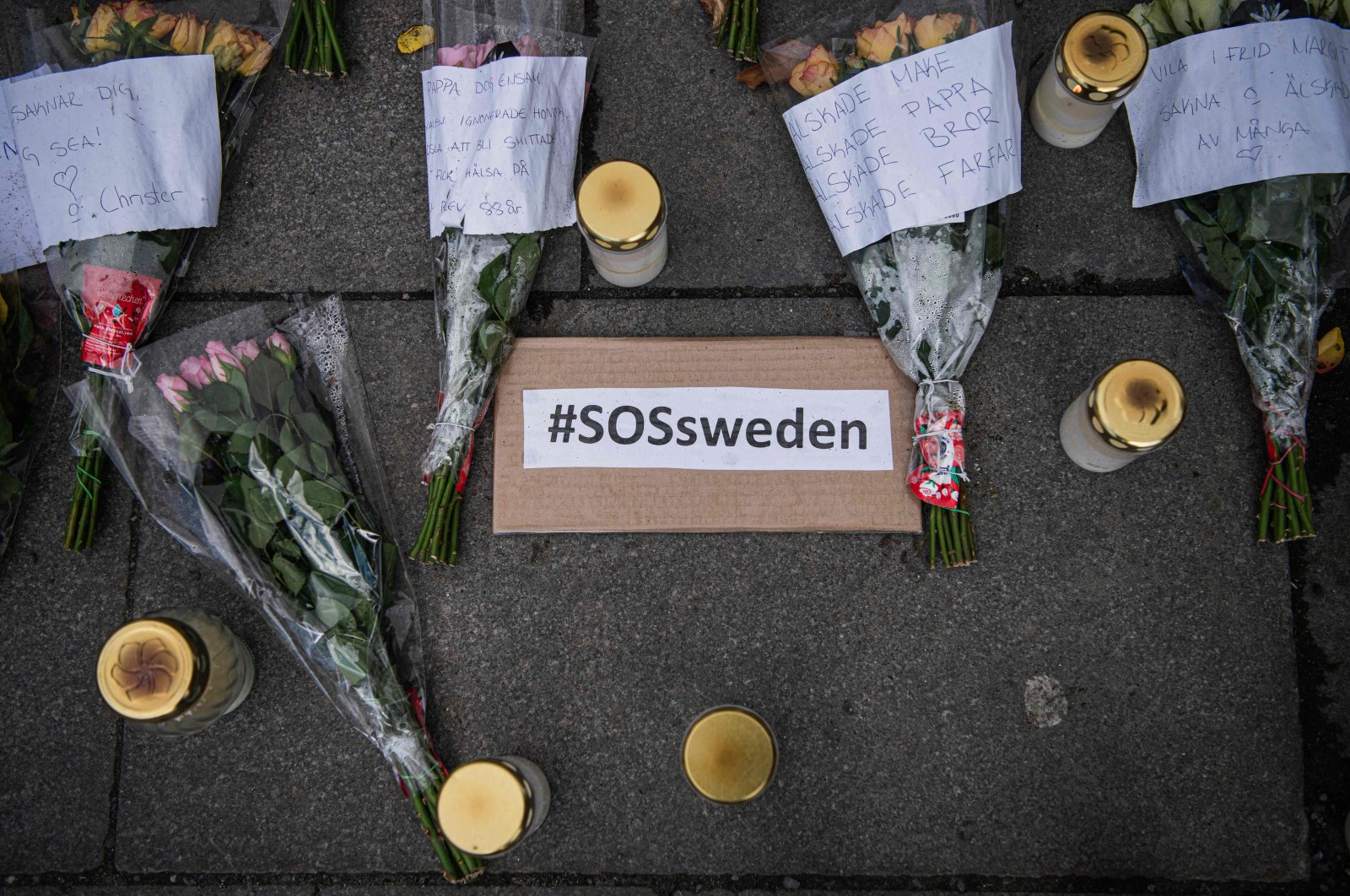 Picture taken on April 29, 2020 showing a memorial in Stockholm's Mynttorget Square to those lost to the new coronavirus. Many have voiced frustration over Sweden's softer approach to curbing the illness. (AFP Photo)