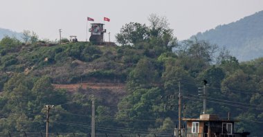 A North Koren frontier post (top) and a South Korean frontier post (front) face each other across the inter-Korean border near the city of Paju, Gyeonggi-do, South Korea, May 3 2020. (EPA Photo)