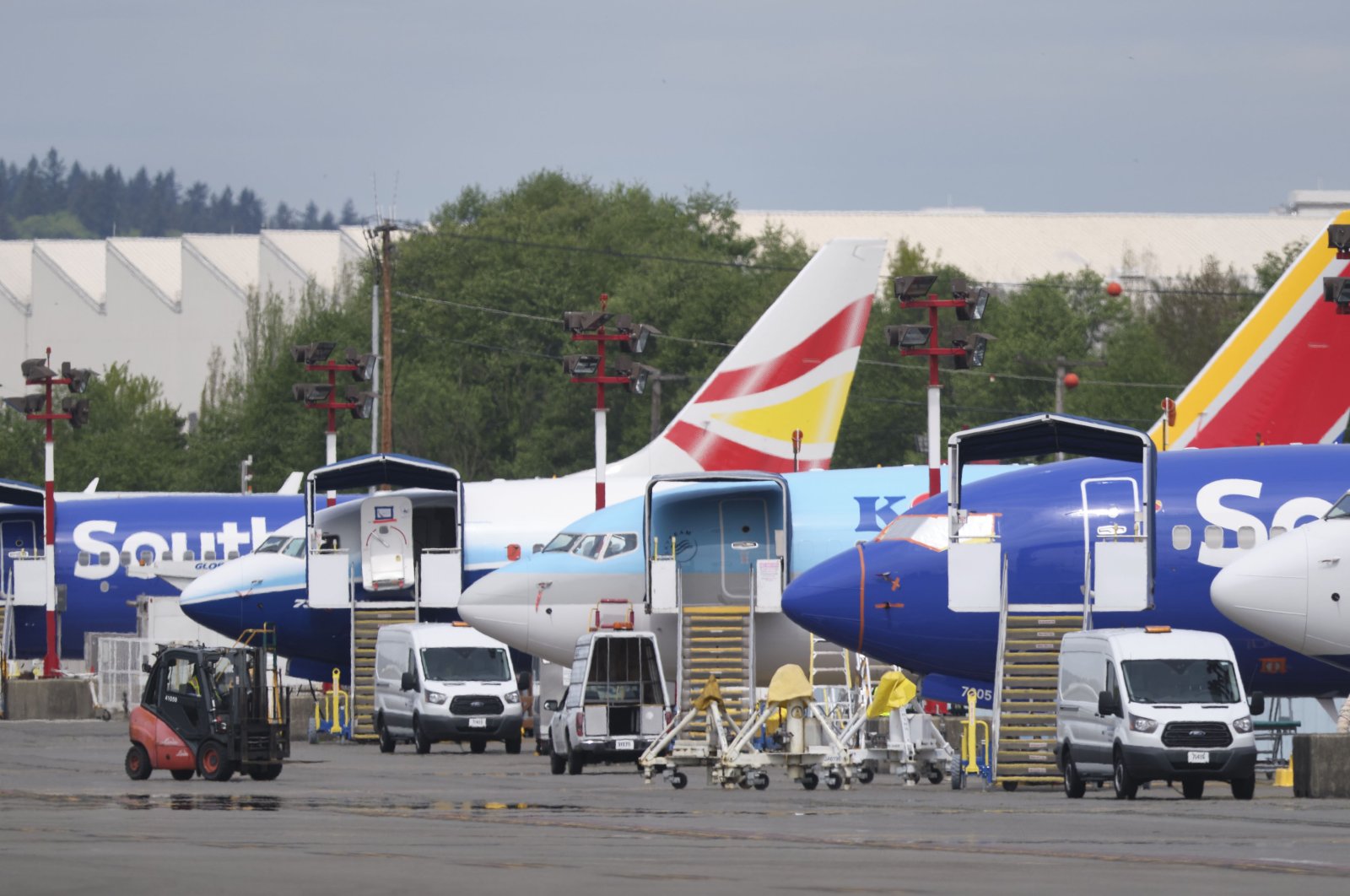 Grounded Boeing 737 MAX airplanes outside the company's factory, Renton, Washington, April 29, 2020. Boeing last week announced that it would lay off 15% of its commercial-airplanes division workforce amid the fallout from the coronavirus pandemic. (AFP Photo)