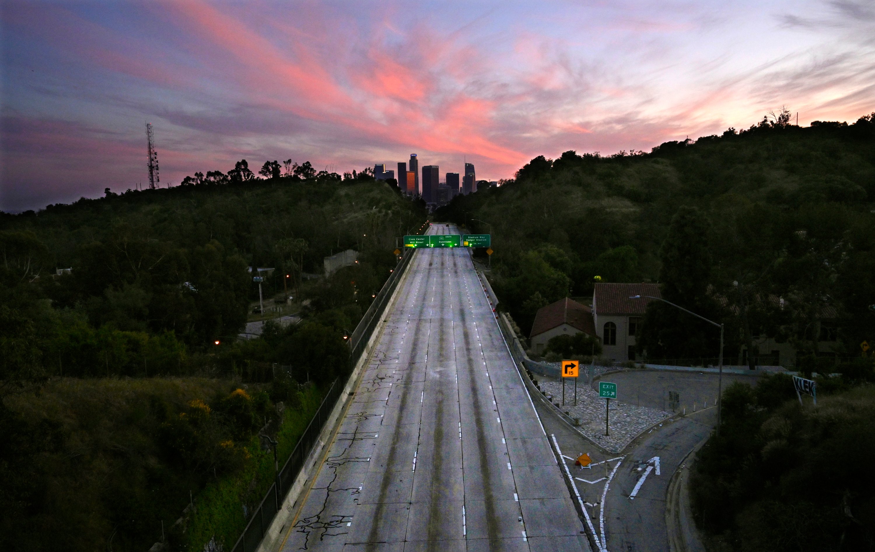 Empty lanes of the 110 Arroyo Seco Parkway that leads to downtown Los Angeles is seen during the coronavirus outbreak, Sunday, April 26, 2020, in Los Angeles, Calif. (AP Photo)