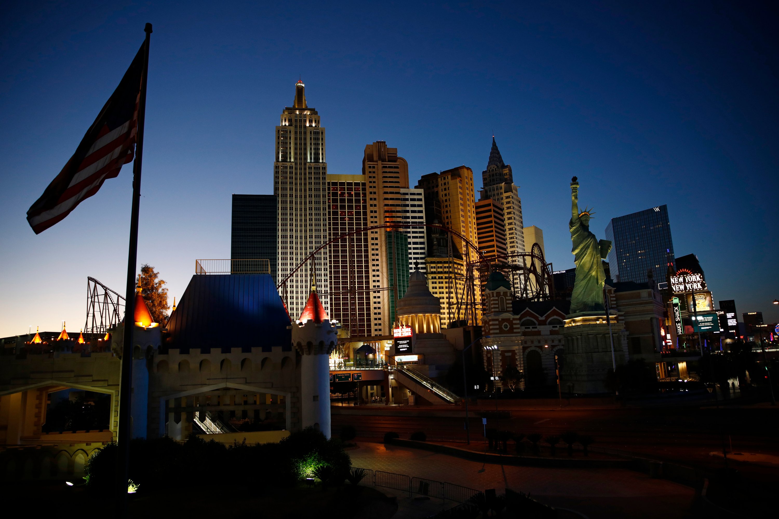 The sun sets along the Las Vegas Strip devoid of the usual crowds and traffic after casinos and other business continue to be shuttered due to the coronavirus Tuesday, April 28, 2020, in Las Vegas. (AP Photo)