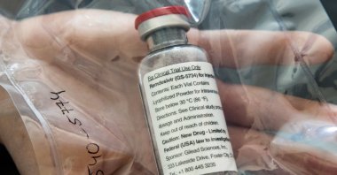 One vial of the drug Remdesivir shown during a news conference about the start of a study with the Ebola drug in particularly severely ill patients at the University Hospital Eppendorf (UKE) in Hamburg, northern Germany, April 8, 2020. (AFP Photo)