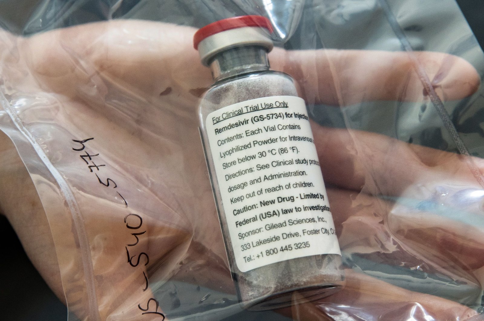One vial of the drug Remdesivir shown during a news conference about the start of a study with the Ebola drug in particularly severely ill patients at the University Hospital Eppendorf (UKE) in Hamburg, northern Germany, April 8, 2020. (AFP Photo)