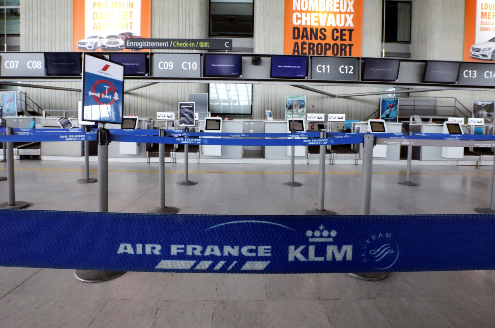 A view shows a deserted Air France check-in desk at Nice international airport, as a lockdown is imposed to slow the rate of the coronavirus disease (COVID-19), in Nice, France, April 13, 2020. (Reuters Photo)