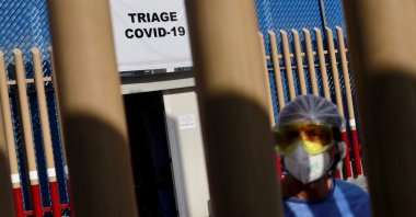 A health worker stands by the entrance of the triage for patients with COVID-19 as the outbreak continues in Mexico City, Mexico, May 4 2020. (Reuters Photo)