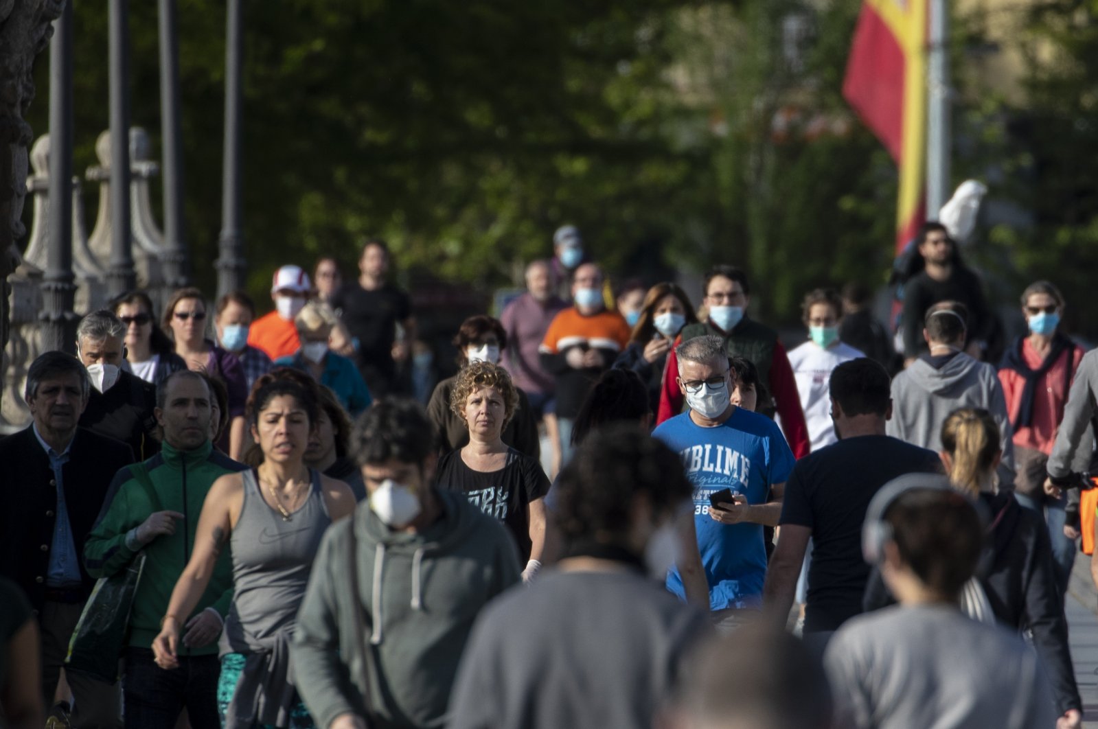 People cross the Toledo bridge in Madrid, Spain, May 3, 2020. (AP Photo)