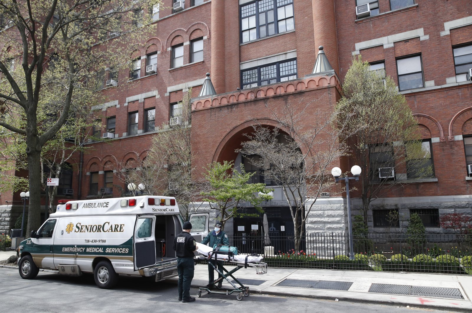 Emergency medical workers arrive at Cobble Hill Health Center in the Brooklyn borough of New York City, New York, April 17, 2020. (AP Photo)