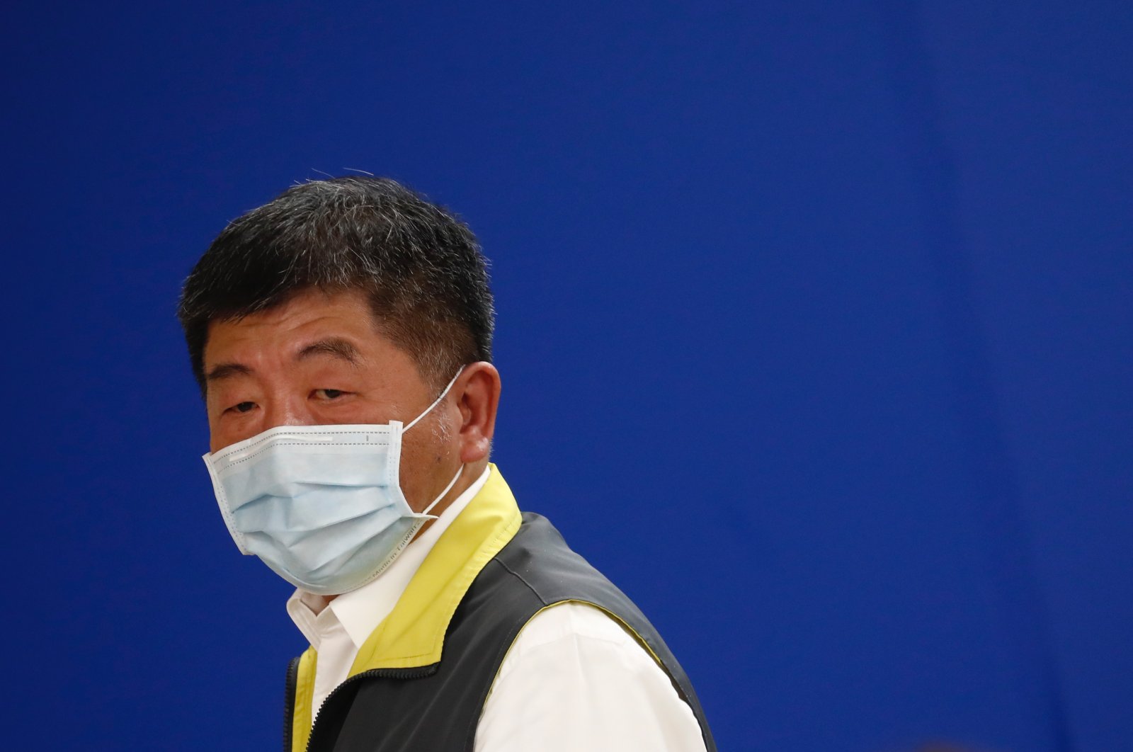 Taiwan Minister of Health and Welfare Chen Shih-Chung leaves after speaking during a press briefing with foreign journalists about the current measures and status in the fight against coronavirus and COVID-19 in Taipei, Taiwan, May 6, 2020. (EPA Photo)
