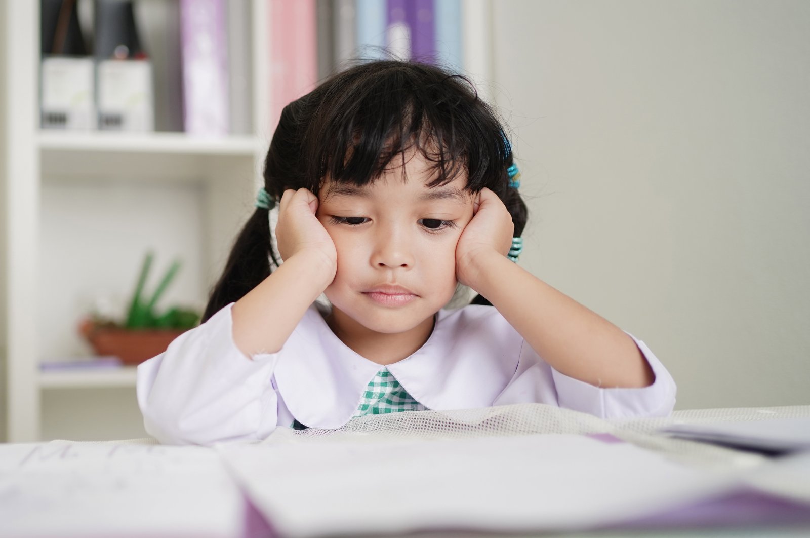 If you catch your child with a frustrated look on their face while studying, try to get them to move around a bit. (Shutterstock Photo)