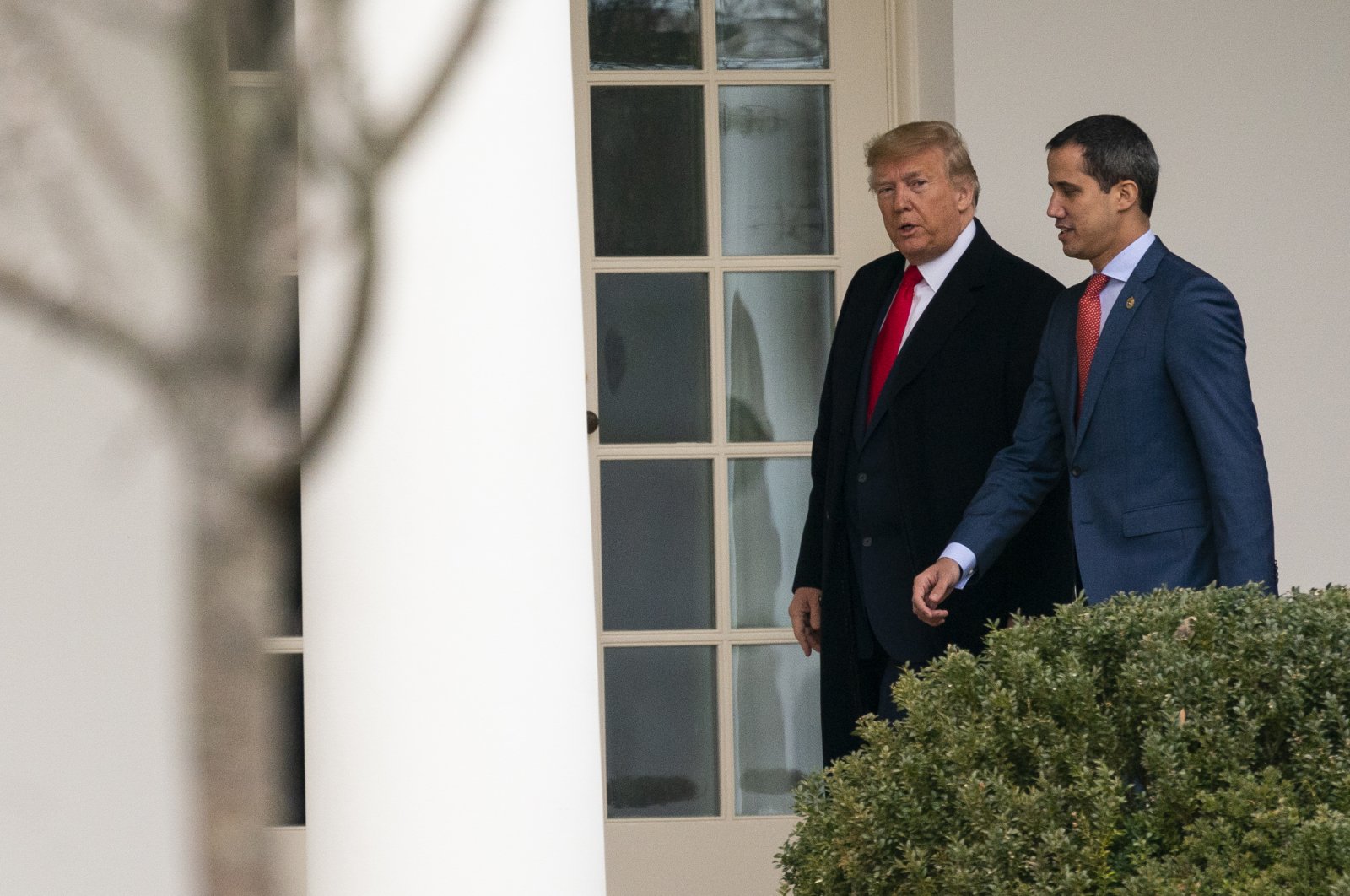 U.S. President Donald Trump walks to a meeting in the Oval Office with Venezuelan opposition leader Juan Guaido at the White House in Washington, Feb. 5, 2020. (AP Photo)