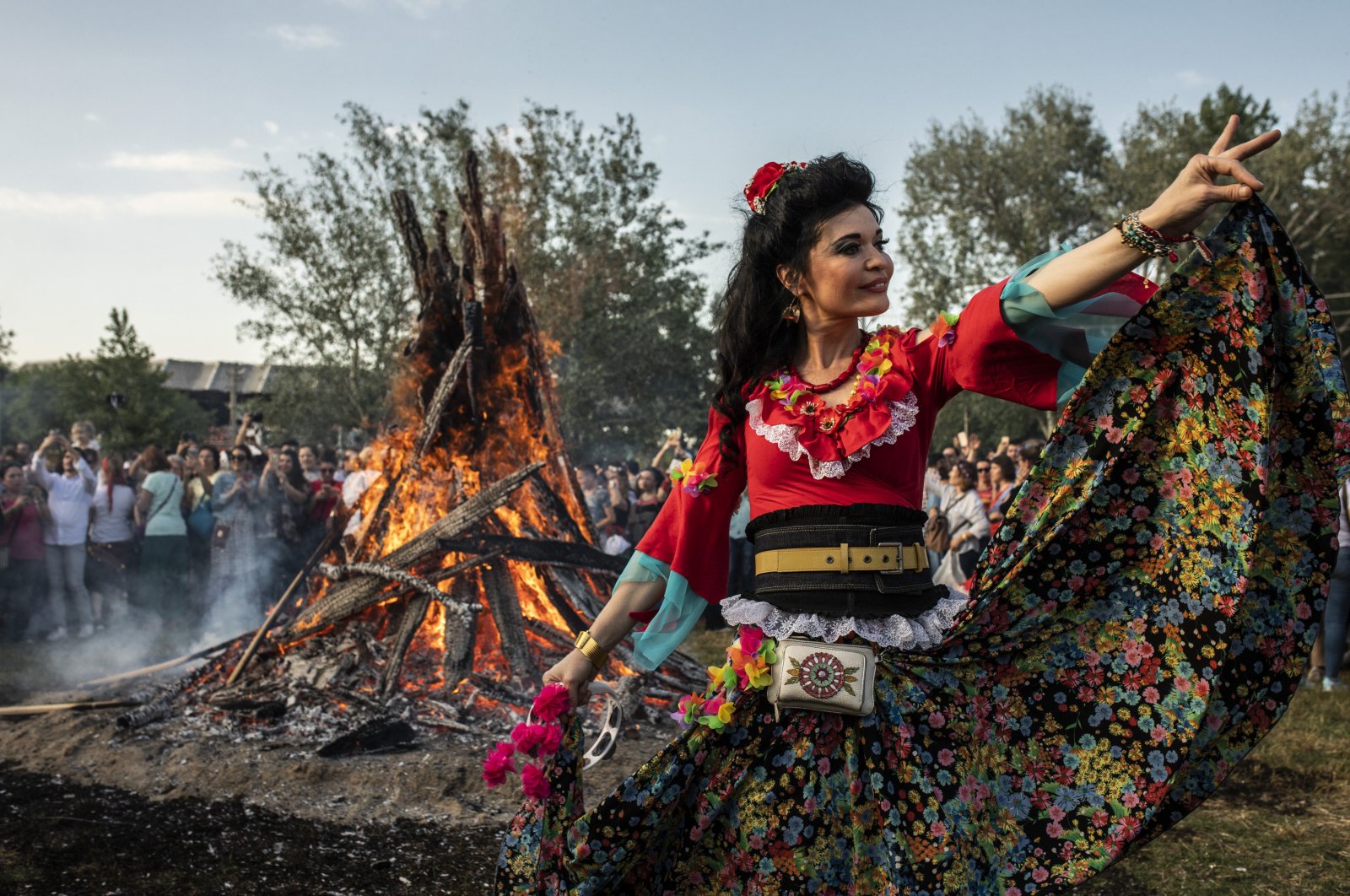 In this undated photo, a woman in traditional attire dances during the Kakava (Hıdırellez) celebrations in the border province of Edirne. (DHA Photo)