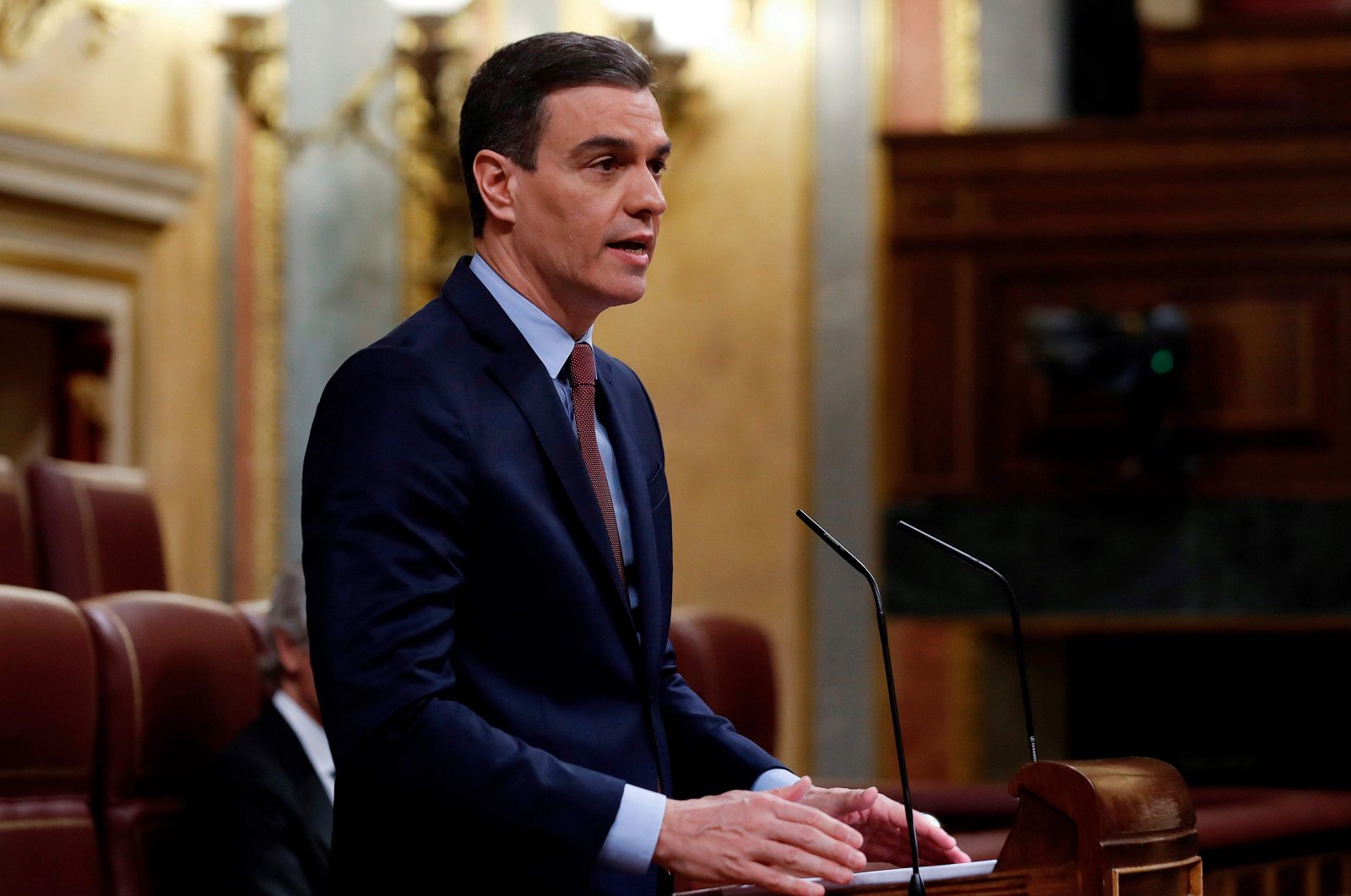 Spanish Prime Minister Pedro Sanchez delivers a speech during a session to debate the extension of a national lockdown to curb the spread of the coronavirus at the Lower Chamber of the Spanish parliament in Madrid, May 6, 2020. (AFP Photo)