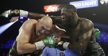 Tyson Fury (L) fights Deontay Wilder during a WBC boxing match in Las Vegas, Feb. 22, 2020. (AP Photo)