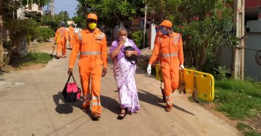 A handout photo made available by the National Disaster Response Force (NDRF) shows personnel during rescue operations after a gas leak at a chemical factory in Visakhapatnam, Andhra Pradesh state, southern India, May 7, 2020. (EPA Photo)