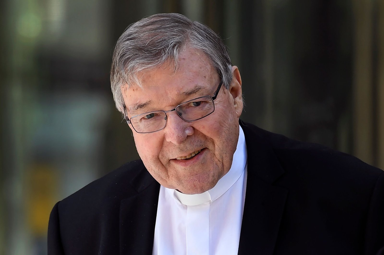 This Dec. 10, 2018, file photo shows Cardinal George Pell walking to a car in Melbourne, Australia. (AFP Photo)