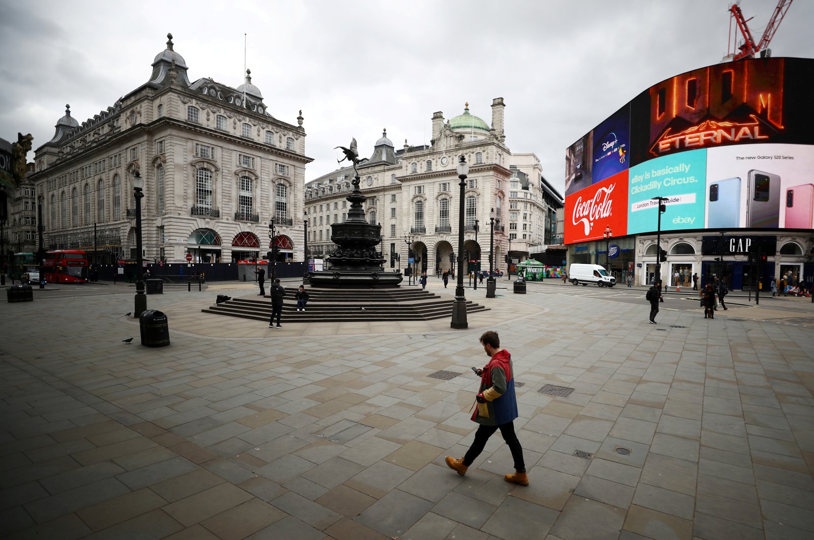 A general view in a deserted Piccadilly Circus as the spread of the coronavirus disease continues, London, Britain, March 20, 2020. (Reuters Photo)