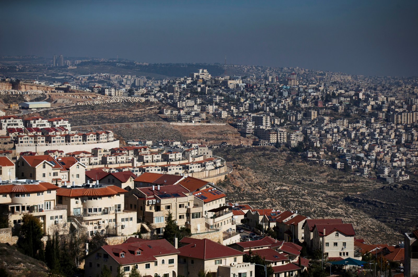A general view picture shows the Israeli settlement of Efrat (L) in the Gush Etzion settlement block as Bethlehem is seen in the background, in the Israeli-occupied West Bank, January 28, 2020. (REUTERS Photo)