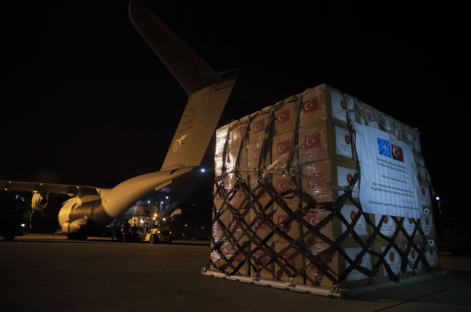 A Turkish military cargo plane with medical supplies and protective equipment to combat COVID-19 in Somalia is loaded at an airport in Ankara, Turkey, May 3, 2020. (AA Photo)