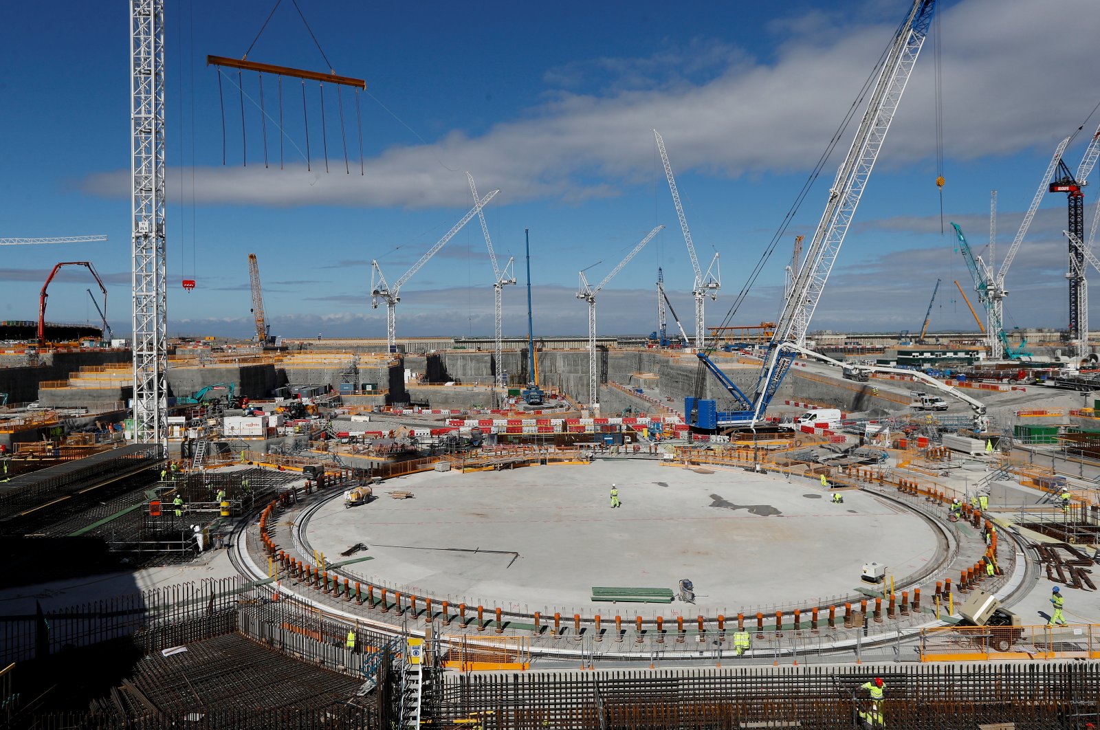 Workers at the nuclear reactor area under construction, are seen at Hinkley Point C nuclear power station site, near Bridgwater, Britain, September 12, 2019. (Reuters Photo)